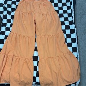 Woman’s small Orange Tiered Pants